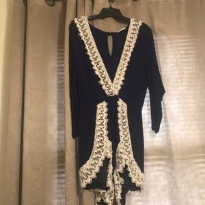 Navy blue romper with white lace